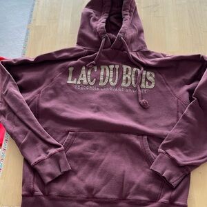 Concordia language Village hoodie. Front pouch pocket, twisted rope hoodie tie.